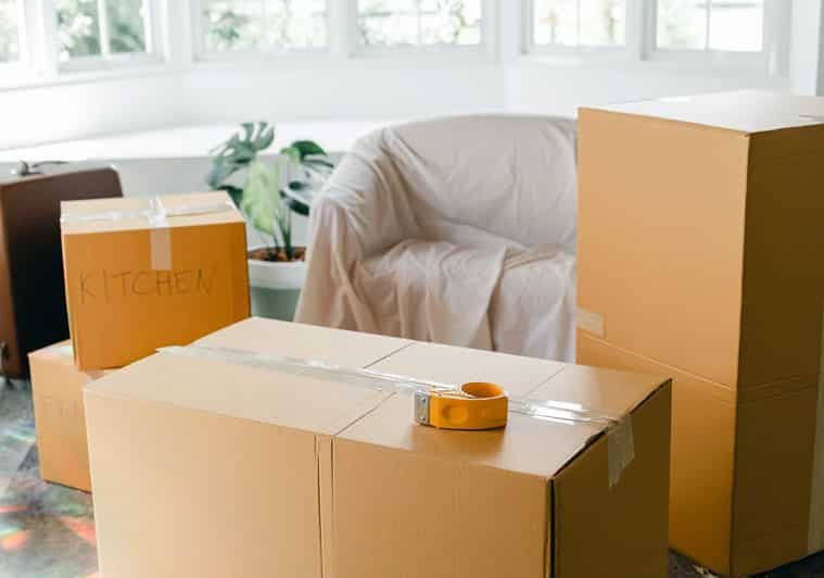 Living Room With Boxes — The Removals Group in Burleigh Heads, QLD
