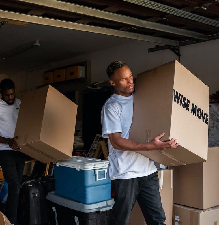 Professional Movers Carrying Boxes - The Removals Group In Robina, QLD