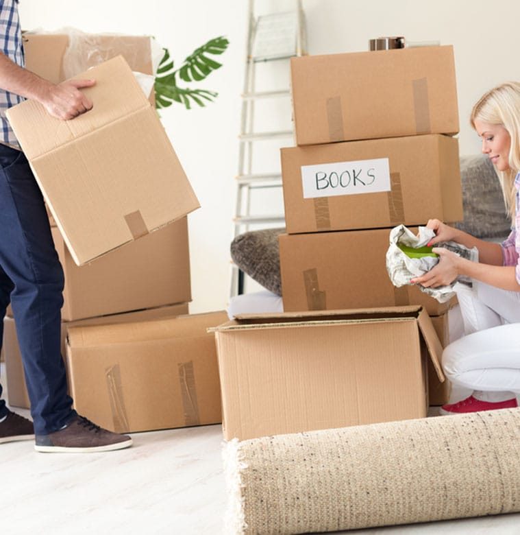 Young Couple Preparing For Moving - The Removals Group In Tweed Heads, QLD